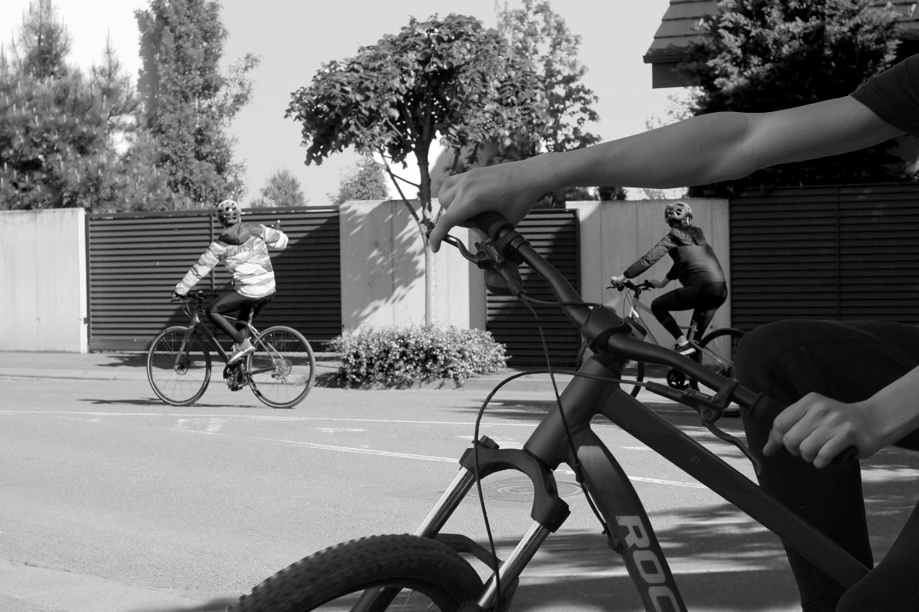 Kids riding their bikes together during a lesson